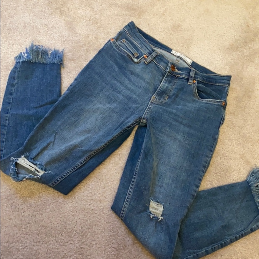 Free People Distressed Denim with fringe bottom